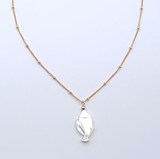 Lucky Fish Necklace featuring a natural mother-of-pearl fish pendant on an 16-inch gold-filled satellite chain.